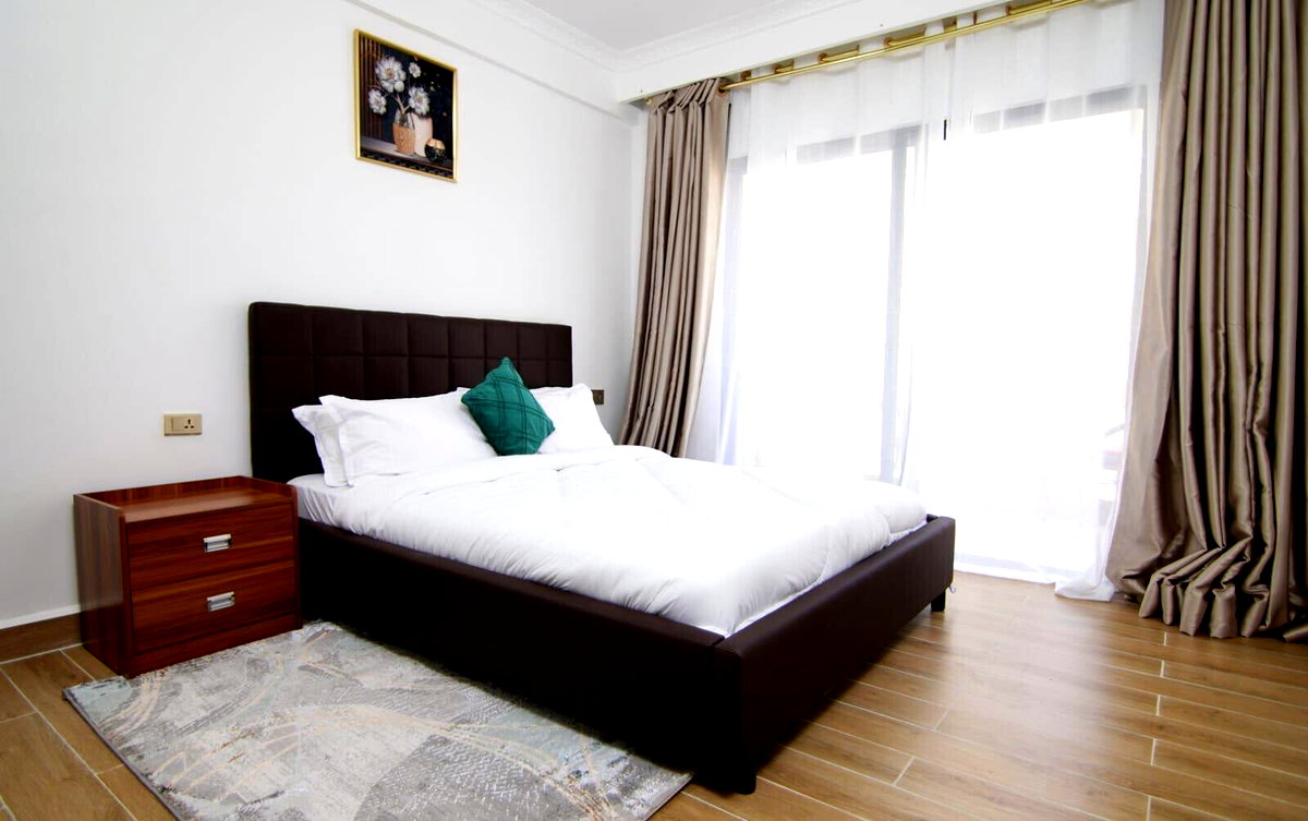 1BR with Custom Finishes & French Windows - Kilimani