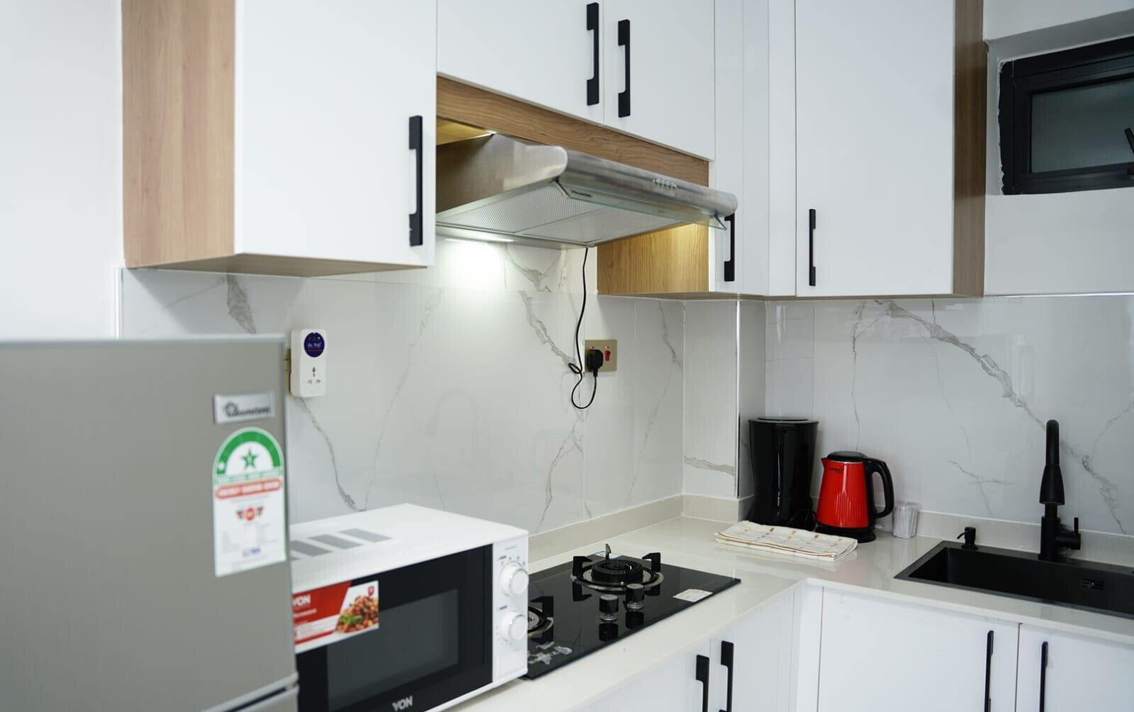 1BR with Custom Finishes & French Windows - Kilimani
