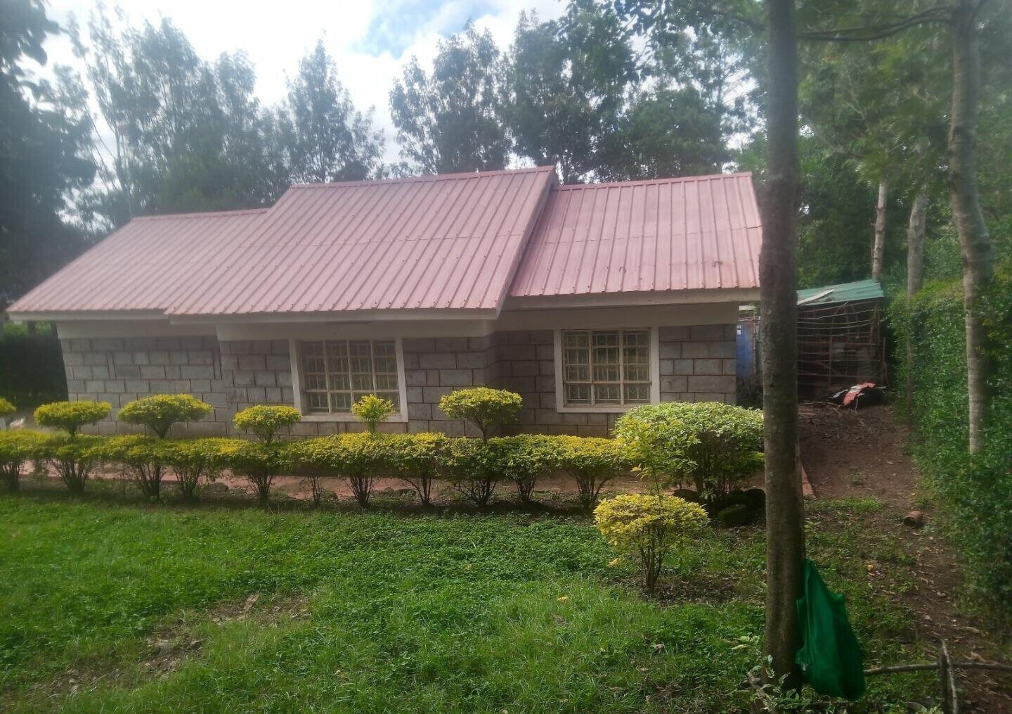 1-Acre Plot with River Frontage in Oloolua