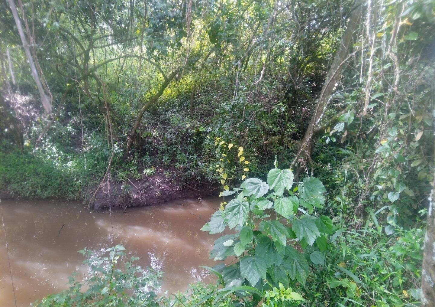 1-Acre Plot with River Frontage in Oloolua