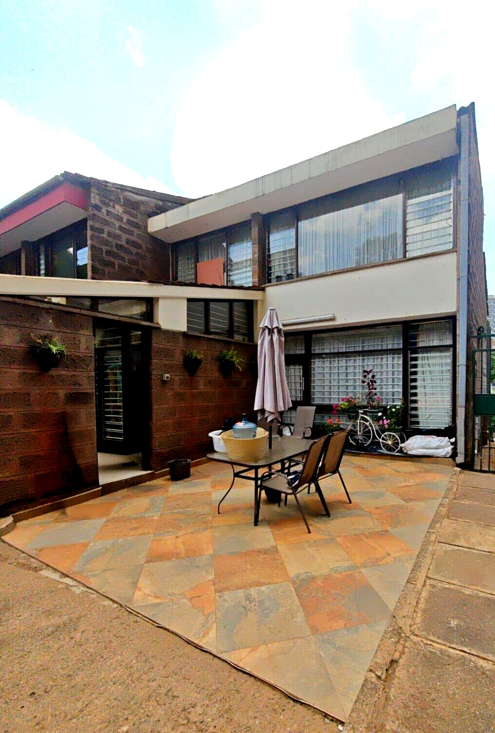4BR Townhouse with Patio & Lawn in Gated Kilimani Estate