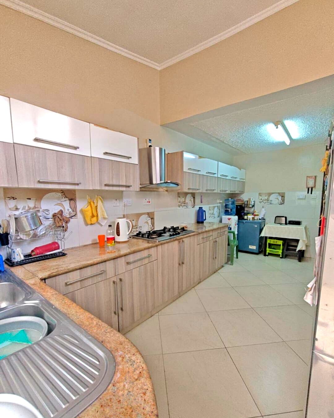 4BR Townhouse with Patio & Lawn in Gated Kilimani Estate