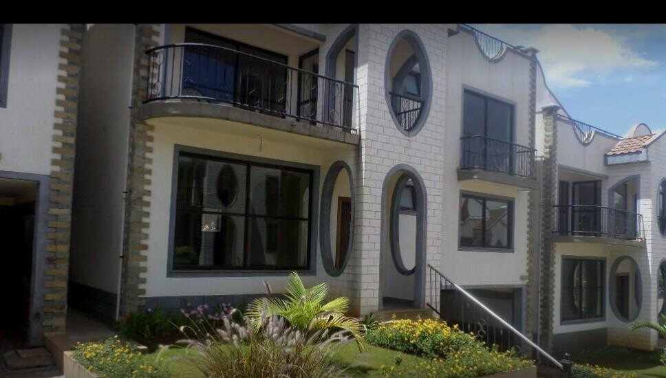 5-Bed Townhouse with Pool & Garden in Gated Spring Valley Estate