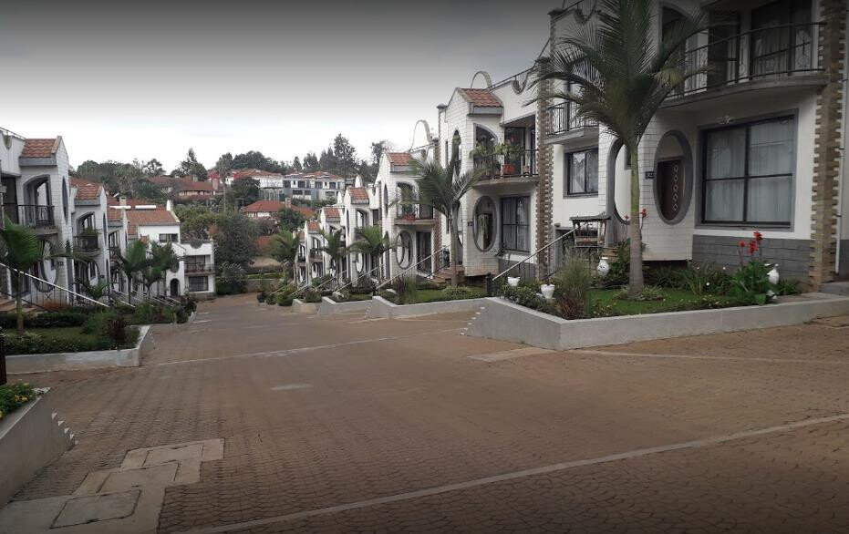 5-Bed Townhouse with Pool & Garden in Gated Spring Valley Estate
