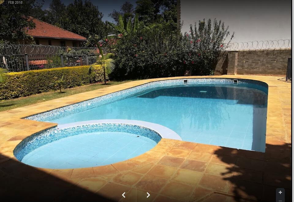 5-Bed Townhouse with Pool & Garden in Gated Spring Valley Estate