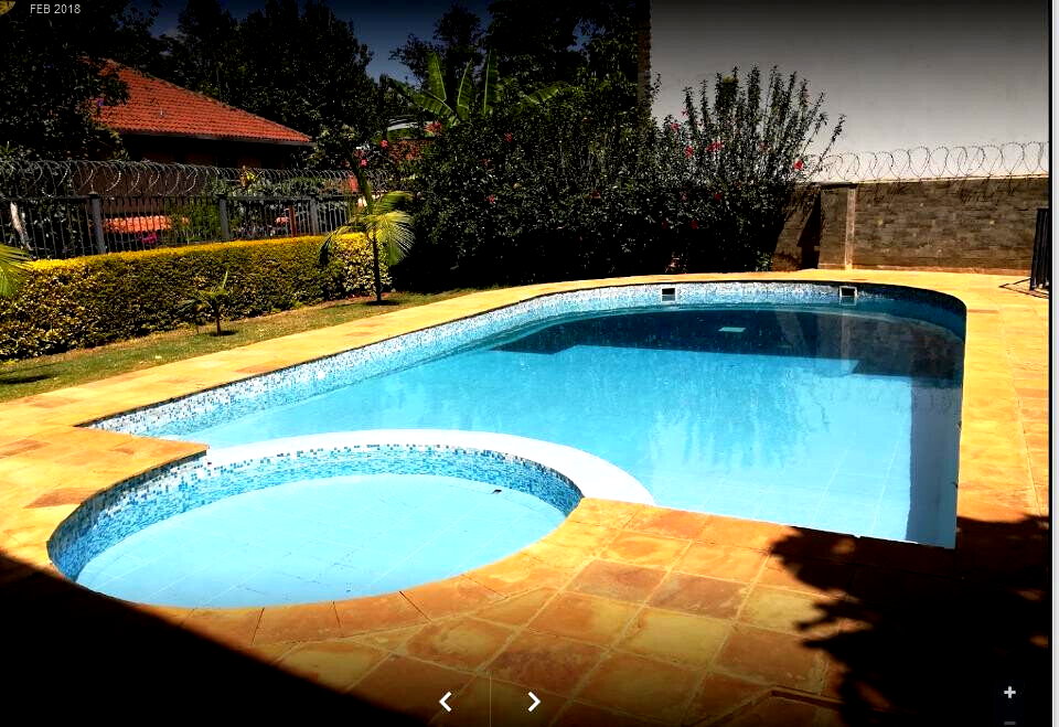 5-Bed Townhouse with Pool & Garden in Gated Spring Valley Estate