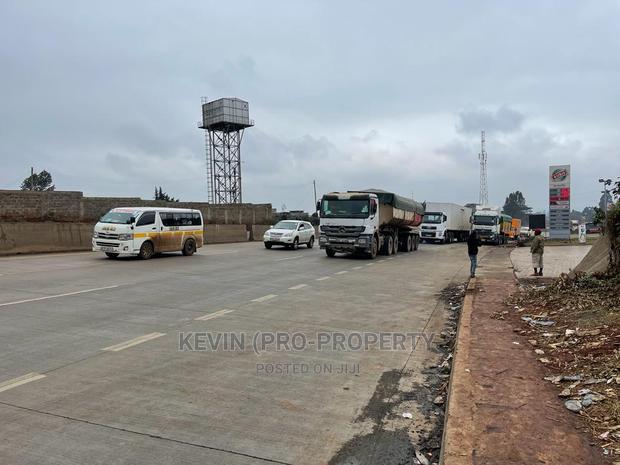 Commercial 100 By 100 Fts Plot Fronting The Tarmac Sigona.