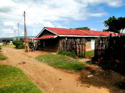Plot for Sale With Semi Permanent Houses in Freearea - Image 2