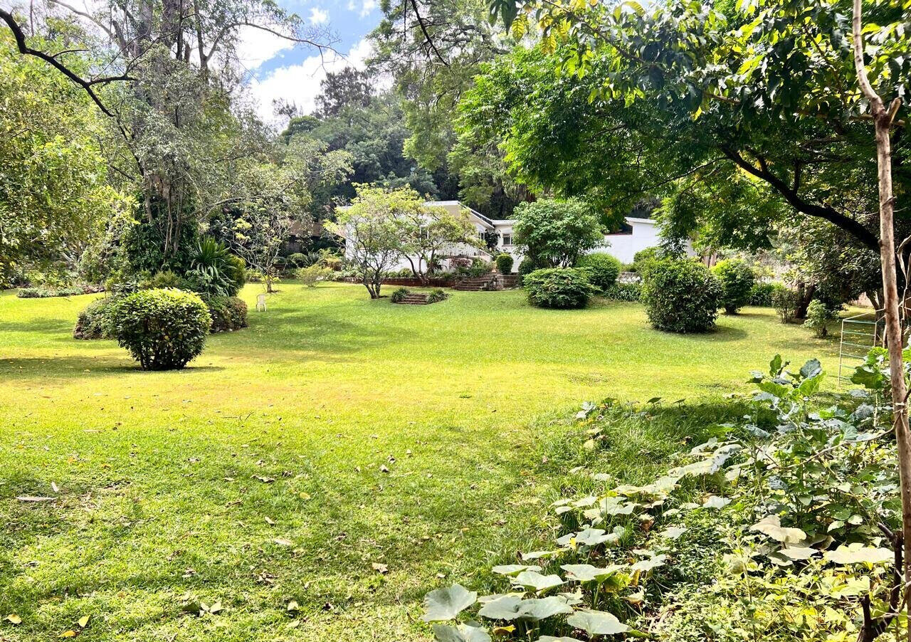 2.5-Acre Riverside Plot with Garden