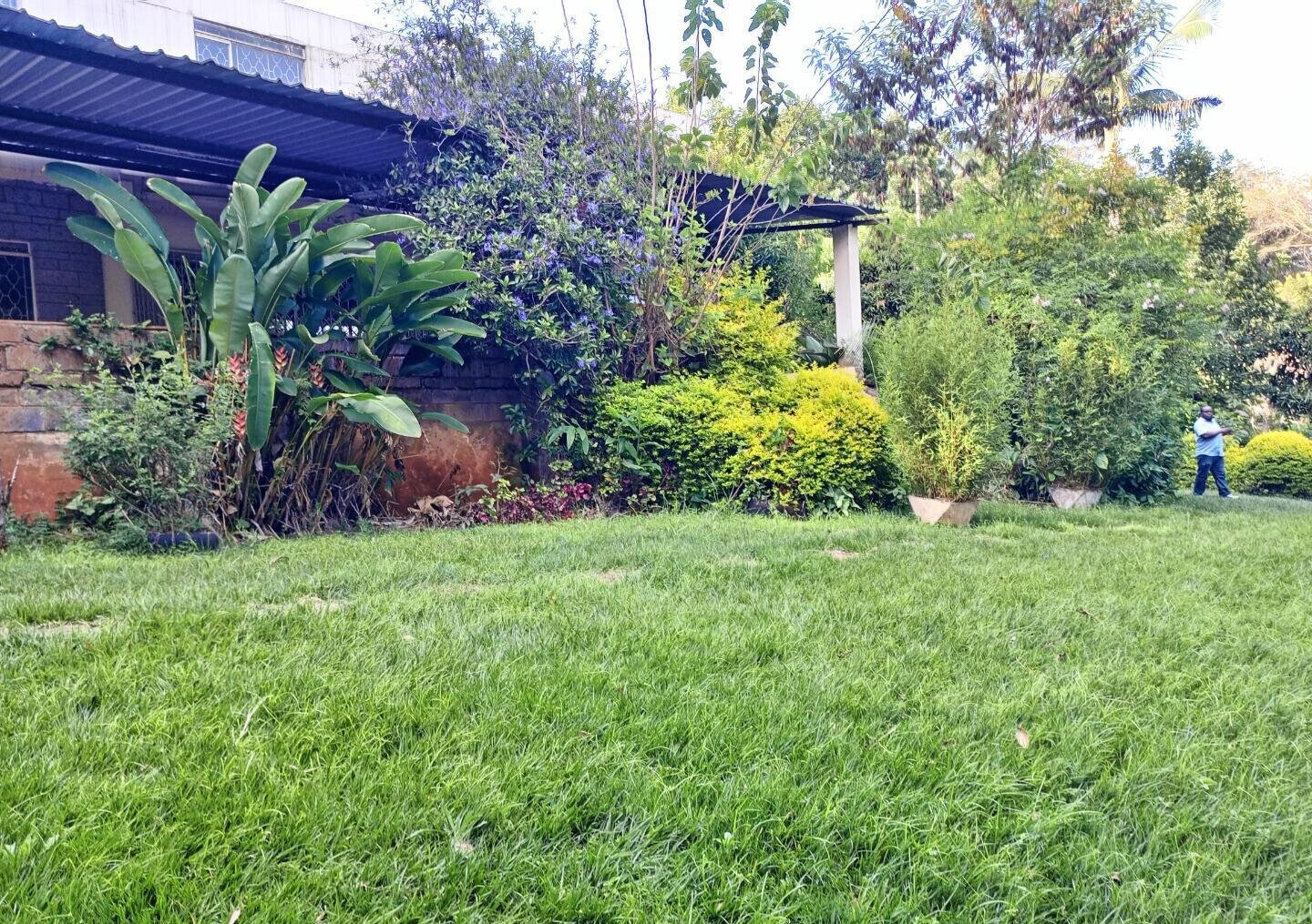 1-Acre Riverside Plot with Garden