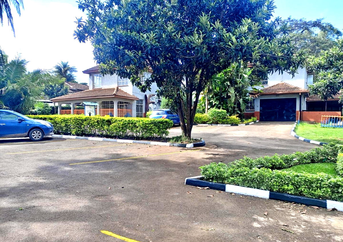 1-Acre Riverside Plot with Garden