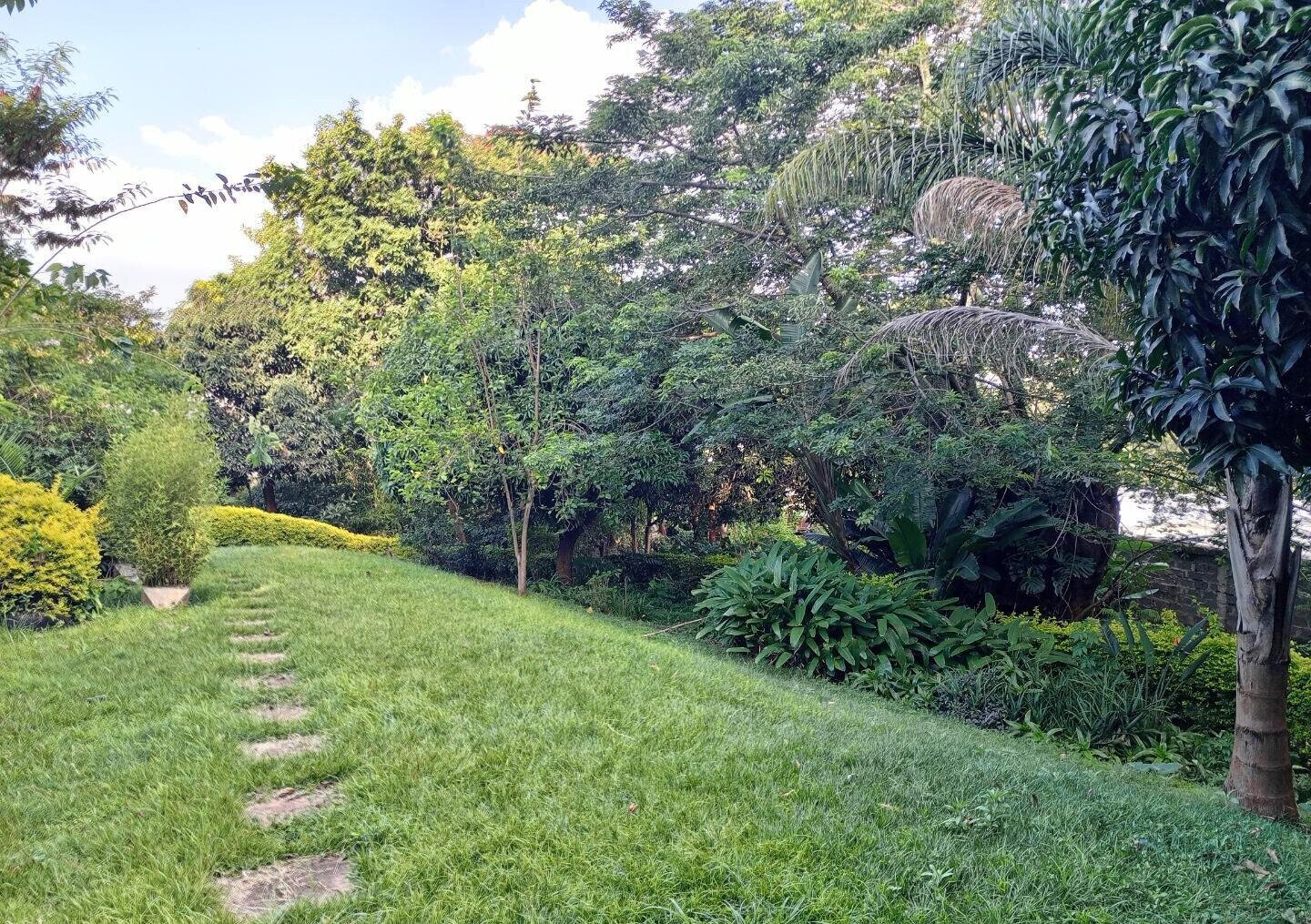 1-Acre Riverside Plot with Garden