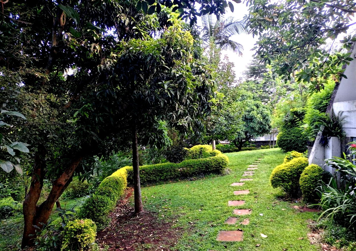 1-Acre Riverside Plot with Garden