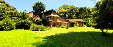 0.57 Acre Plot with 1BR House