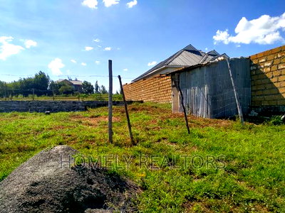 Eighth Acre Plot in Kiserian GP With 3-BDRM House Foundation - Image 2