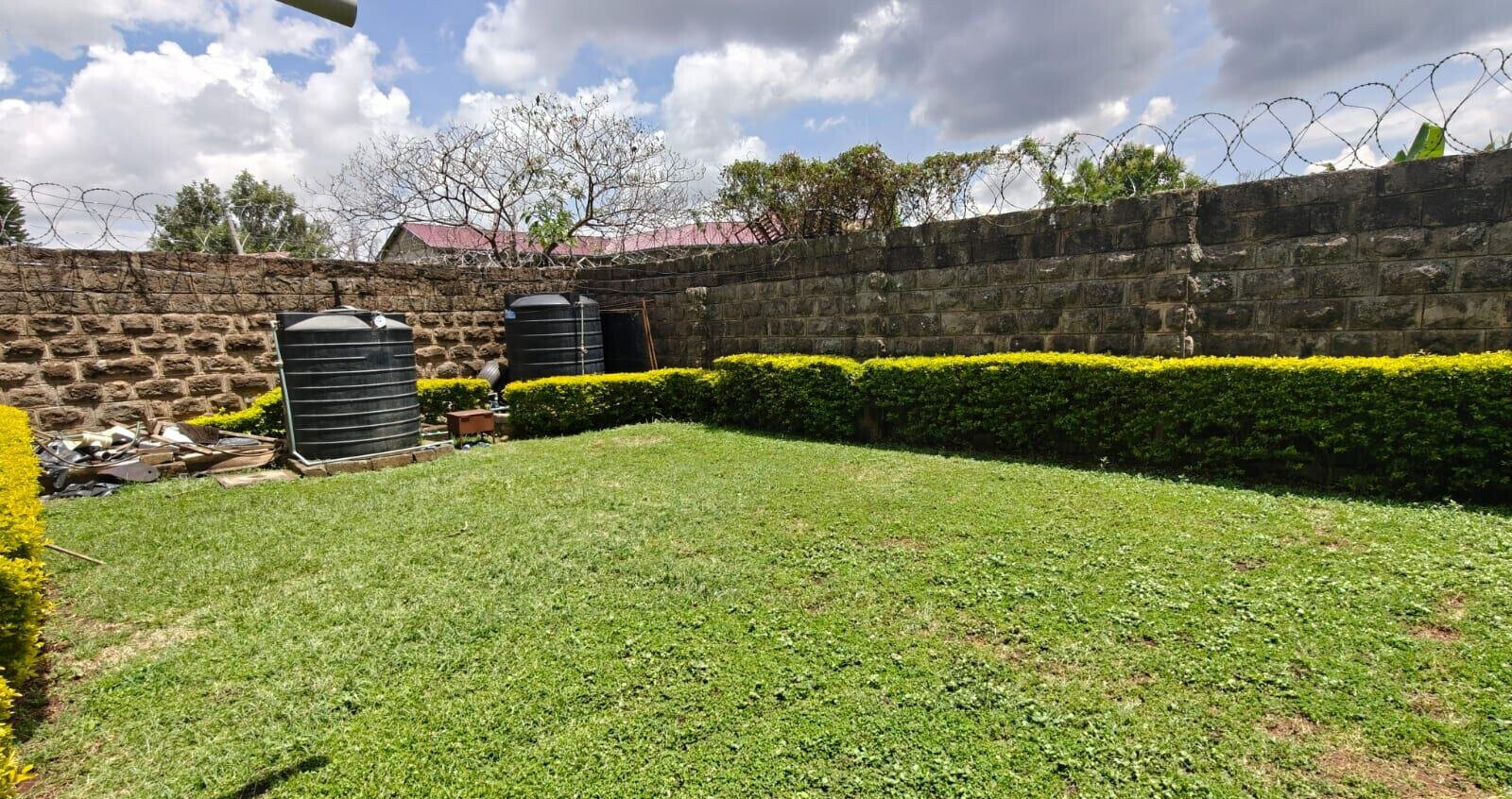 4BR Townhouse with DSQ & Mini-Lawn – Langata