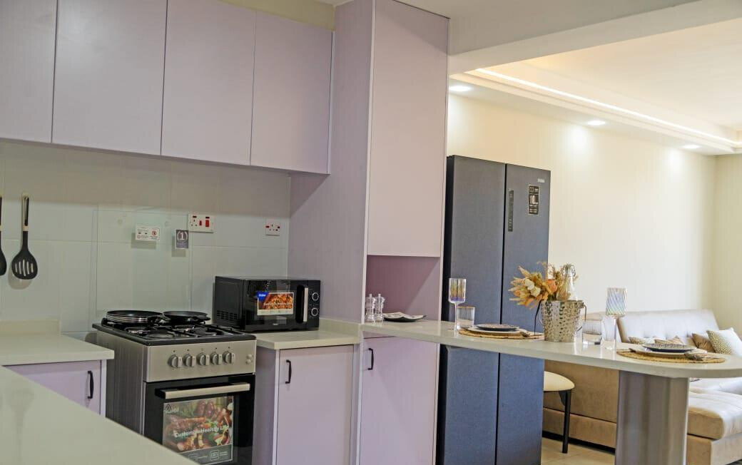 2BR Apartment with Pool & Mall Access - Kitengela's Gated Gem